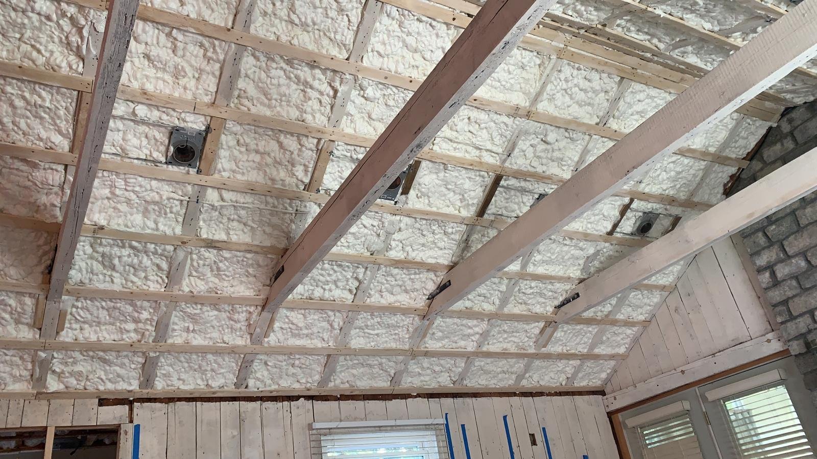 Roof deck spray foam application